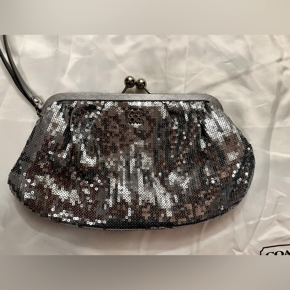 Silver sequin COACH wristlet / clutch